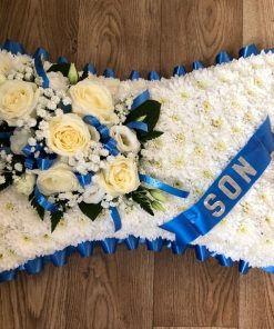 White Pillow with Coloured Corsage