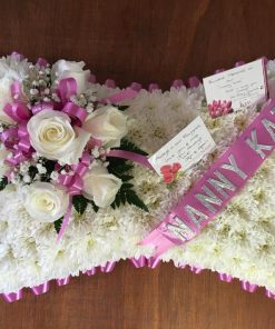 Alternative view of White Pillow with Coloured Corsage
