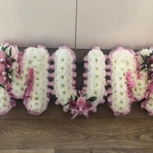 White Letters with Coloured Corsage